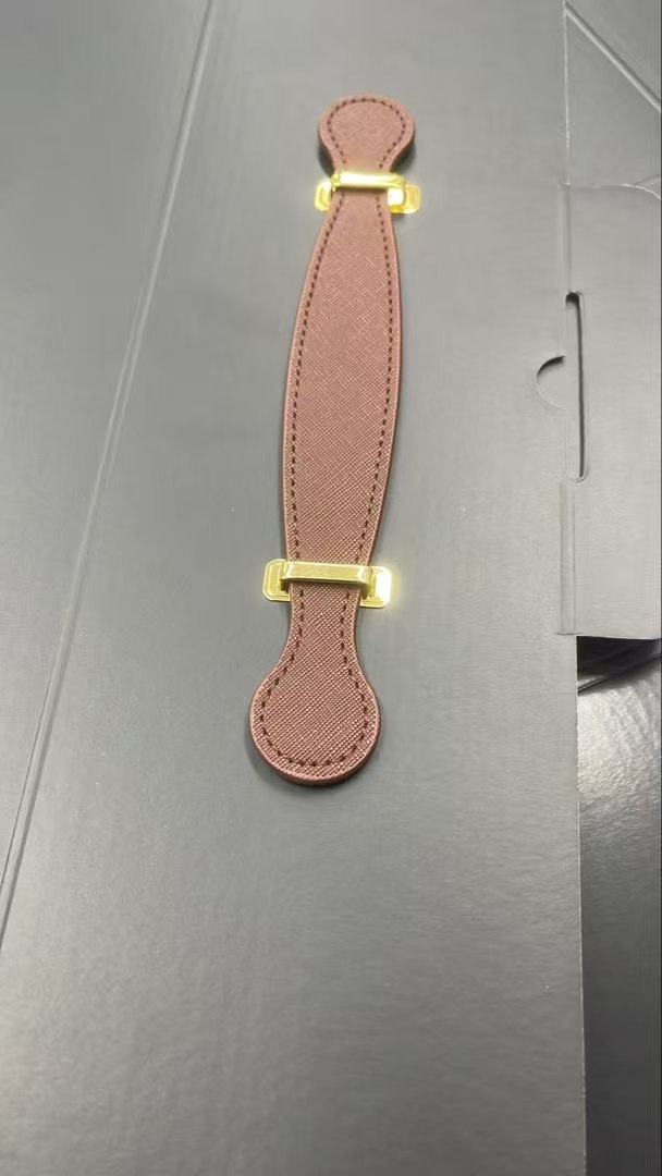 Brown PU carry handle with gold-colour metal fittings for gift packaging